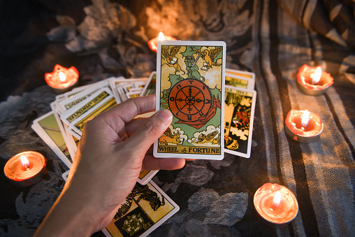 https://media.istockphoto.com/photos/hand-holding-tarot-card-with-candlelight-on-the-darkness-background-picture-id1202954539?b=1&k=20&m=1202954539&s=170667a&w=0&h=Y2mCnRonkkwOsHpiBfaDF8vQLLFqFW3ppy1zLmOUaHM=