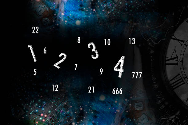 hand holds a clock on the background of space and numerology - numerologia imagens e fotografias de stock