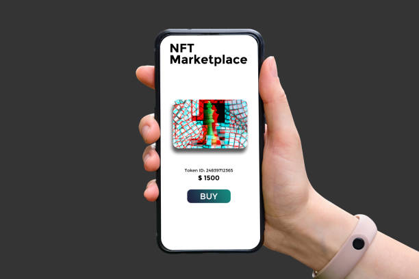 Hand holds smartphone with type of cryptographic NFT marketplace 