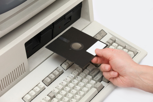 Hand Inserting Old Floppy Disk Drive Into Vintage Eigthies Computer Stock Photo - Download Image ...