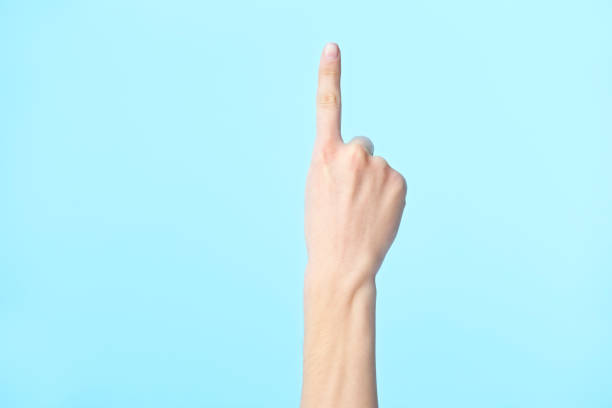 hand of female showing number one stock photo