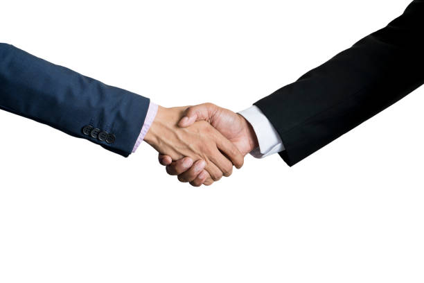 Hand shake between two businessmen isolated on white background stock photo
