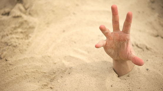 Hand Sinking In Quicksand Trying To Get Out Tips To Survive In Desert  Buried Stock Photo - Download Image Now - iStock