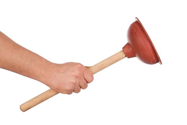 Hand with Plunger stock photo