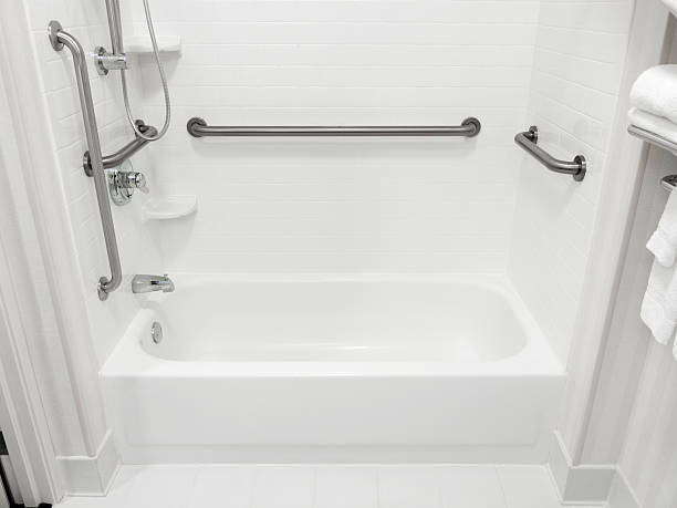 Handicapped Disabled Access Bathroom Handicapped disabled access bathroom bathtub with grab bars. bannister stock pictures, royalty-free photos & images