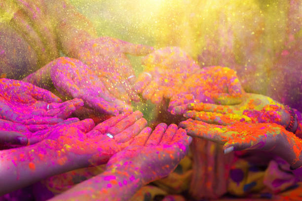 Hands and colorful powders of the holi festival Colors of the holi celebration holi photos stock pictures, royalty-free photos & images
