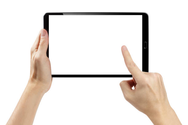 manos sosteniendo tableta negra sobre blanco - ipad fotografías e imágenes de stock