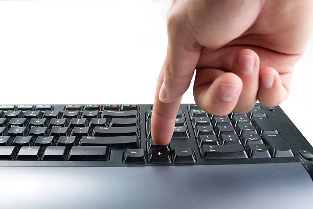 Hand's Man pressing a keyboard computer stock photo