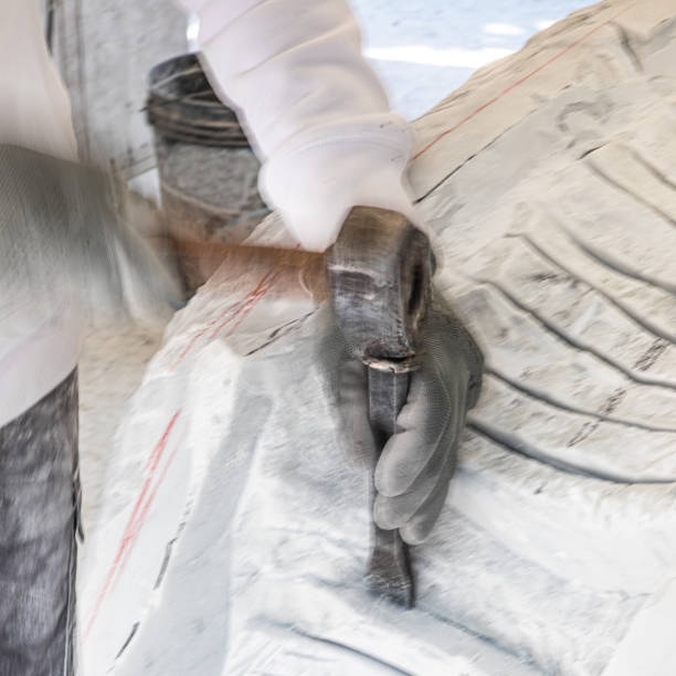 Hands of artist who work the marble with hammer and chisel stock photo