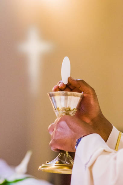 hands of the pope celebrated the Eucharist bread becomes the body of Christ in the hands of the pope, holy father, wine becomes blood chalice photos stock pictures, royalty-free photos & images