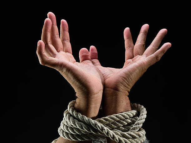 Hands Tied Up  hands tied up stock pictures, royalty-free photos & images