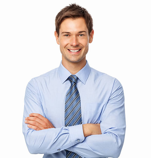 Handsome Businessman Standing Arms Crossed stock photo