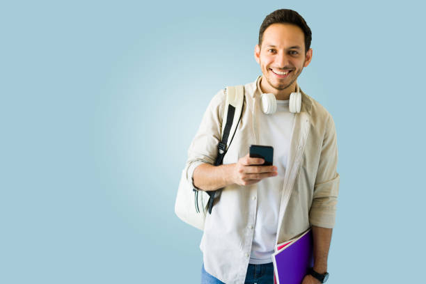 Handsome man going back to school stock photo