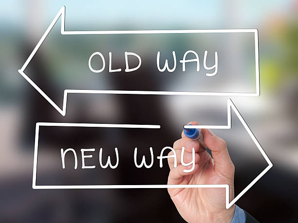 Handwriting Old Way or New Way with marker on visual screen stock photo