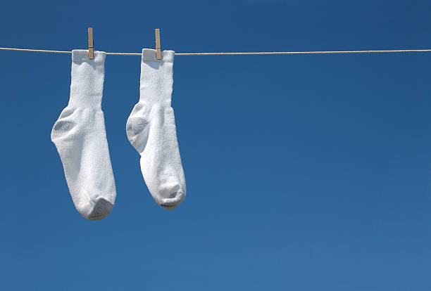 Hang in there socks Picture of socks drying out. See Also: sock stock pictures, royalty-free photos & images
