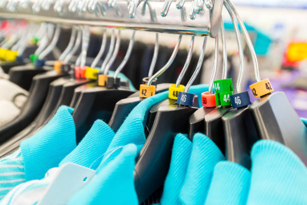 Hangers for clothes in shop with dimensional marks stock photo