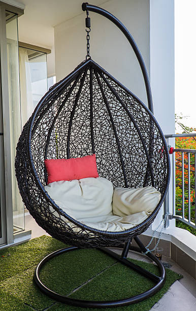 Hanging chair on the terrace stock photo