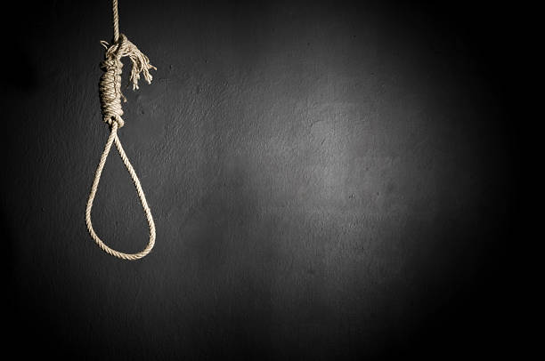 A hanging noose rope on black background Cruel SuicideSEE MORE RELATED IMAGES execution stock pictures, royalty-free photos & images