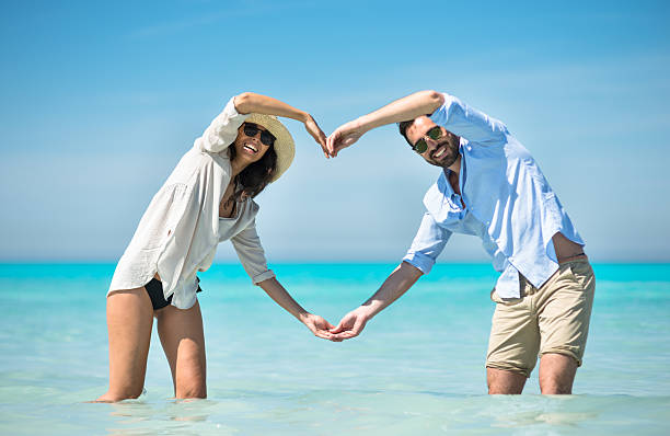 Happiness couple at the seaside Happiness couple at the seaside valentine's day holiday stock pictures, royalty-free photos & images
