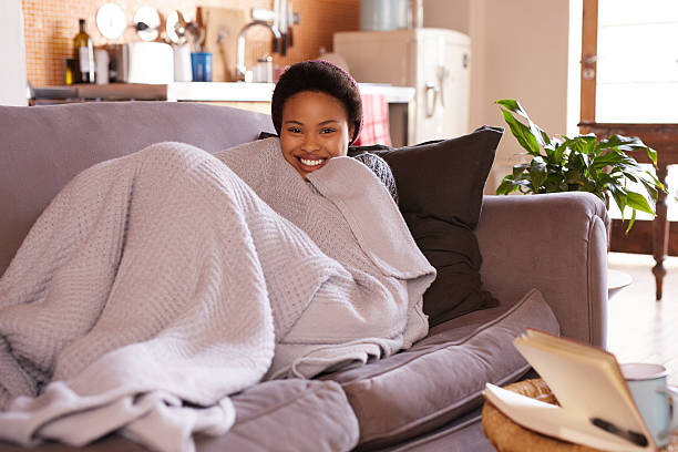 Happiness is a day on the couch stock photo