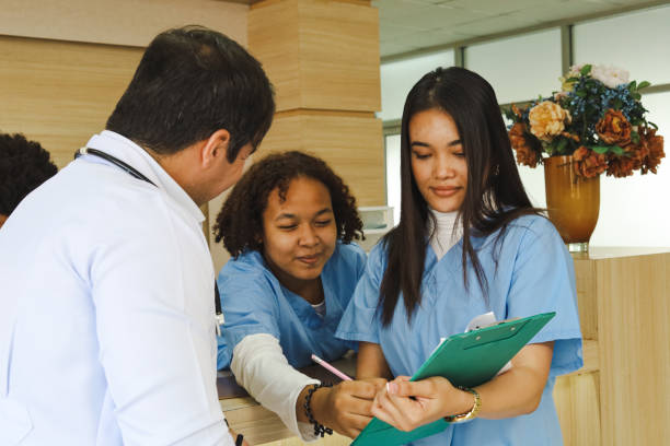Happiness Medical students talking Consult with the doctor in the hospital. stock photo