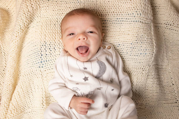 Happy 2 Month Old Baby Boy Smiling stock photo