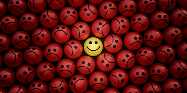 Happy and sad funny face ball character in crowd 3d render stock photo