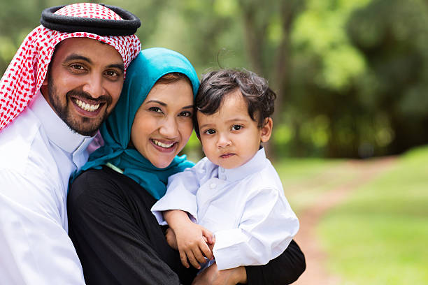 happy Arabic family portrait of Arabic family at the park saudi arabia photos stock pictures, royalty-free photos & images