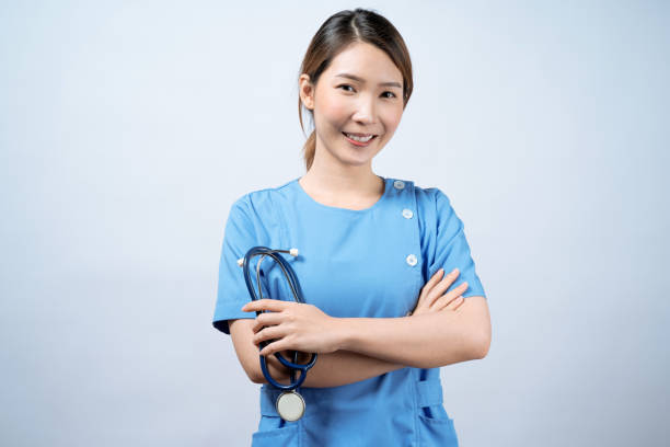 Happy Asian nurse woman smile face, Isolated on white background. stock photo