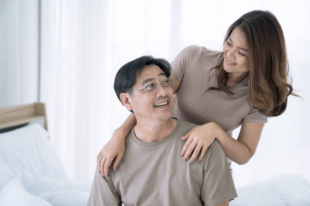 Happy Asian senior couple stay together at home in romantic moment, Happy life retirement. stock photo