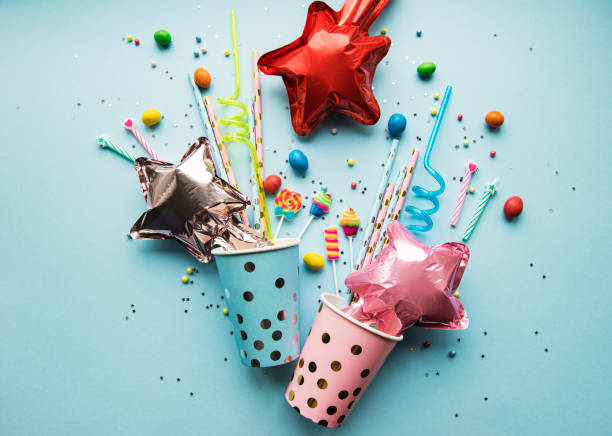 happy birthday or party background - carnival accessories flat lay imagens e fotografias de stock