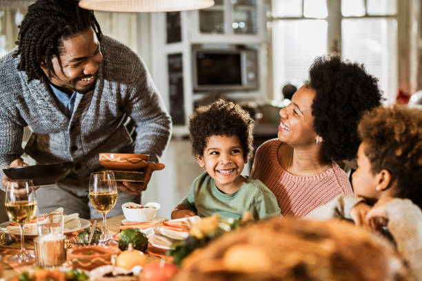 Black Family Christmas Dinner Stock Photos, Pictures & Royalty-Free