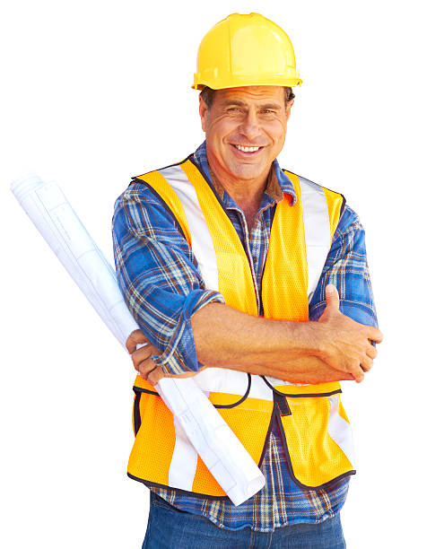Happy Building Contractor At Construction Site stock photo