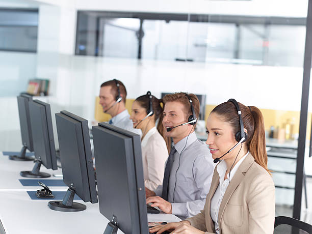 Happy call center operators stock photo