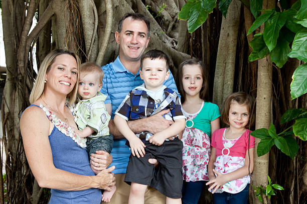 Happy caucasian family of six outdoors stock photo