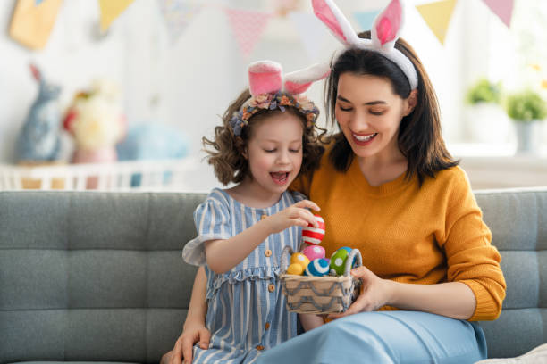 Happy family are preparing for Easter stock photo