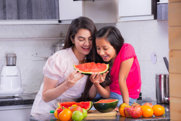 Happy family in the kitchen. stock photo Mother, Breakfast, Daughter, Dinner on diet stock pictures, royalty-free photos & images