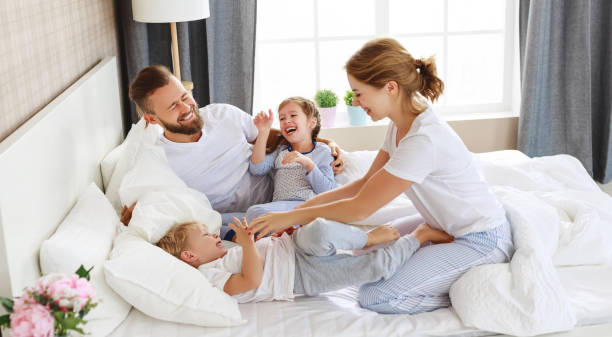 129,088 Family Bed Stock Photos, Pictures &amp; Royalty-Free Images - iStock