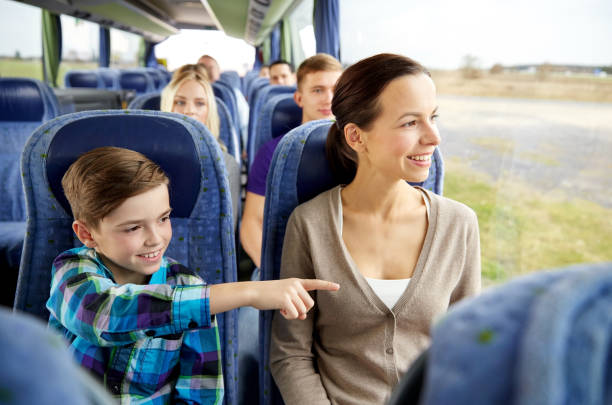 happy family riding in travel bus​​​ foto