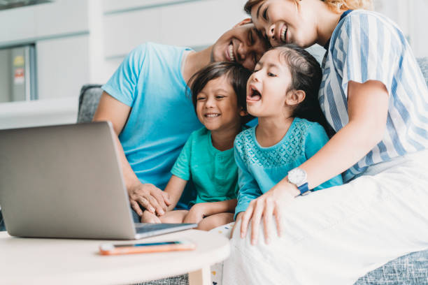 Family using laptop