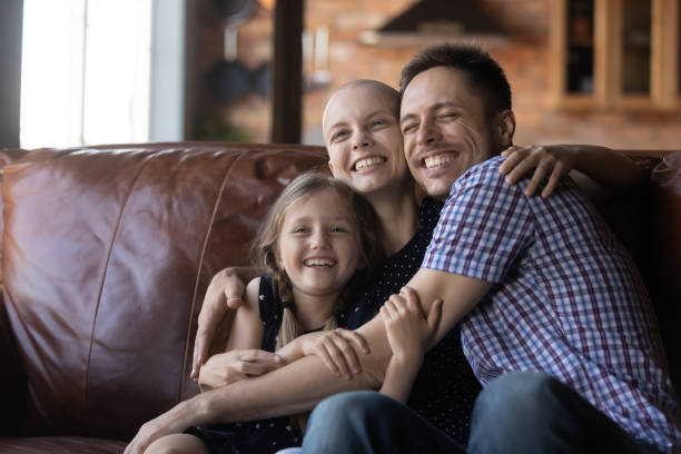 happy family with sick mom embrace at home - cancer imagens e fotografias de stock