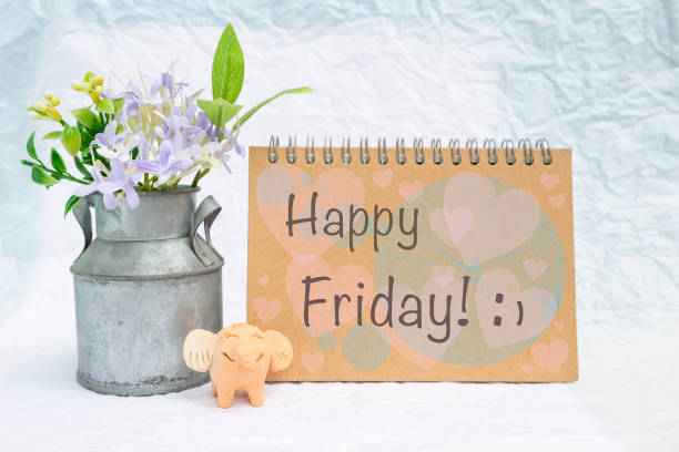 Happy Friday card with happy elephant clay and tin flower pot Happy Friday card with happy elephant clay and tin flower pot over blurred white background happy friday stock pictures, royalty-free photos & images