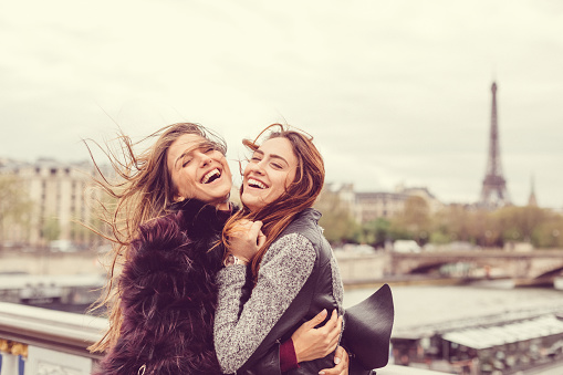 Happy girls enjoying Paris together stock photo