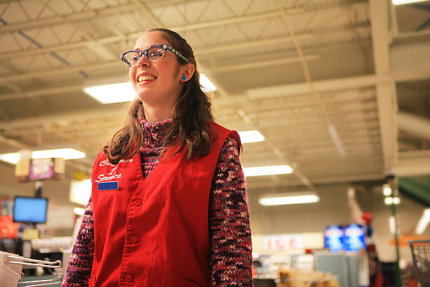 Happy Grocery Cashier/Bagger stock photo