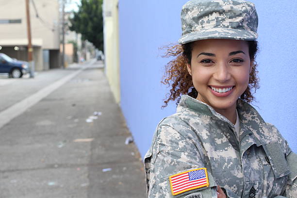 Happy healthy ethnic army female soldier Happy healthy ethnic army female soldier. military uniform stock pictures, royalty-free photos & images
