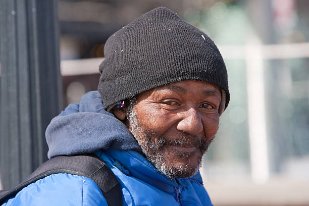Happy homeless african american man Happy homeless african american man outdoors during the day. homelessness stock pictures, royalty-free photos & images