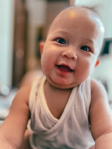 Happy infant stock photo