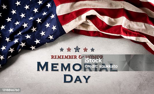 istock Happy memorial day concept made from american flag with the text on dark stone background. 1318846760