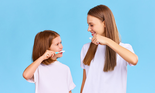 Grooming Activities Children That Creative in 2022 happy-mother-and-daughter-with-toothbrushes-looking-at-each-othe-picture-id1313248441?b=1&k=20&m=1313248441&s=170667a&w=0&h=ys95shQ_Ci2Nr-o8EwSYe8DmaPebyOtryuyU4_NM13A=