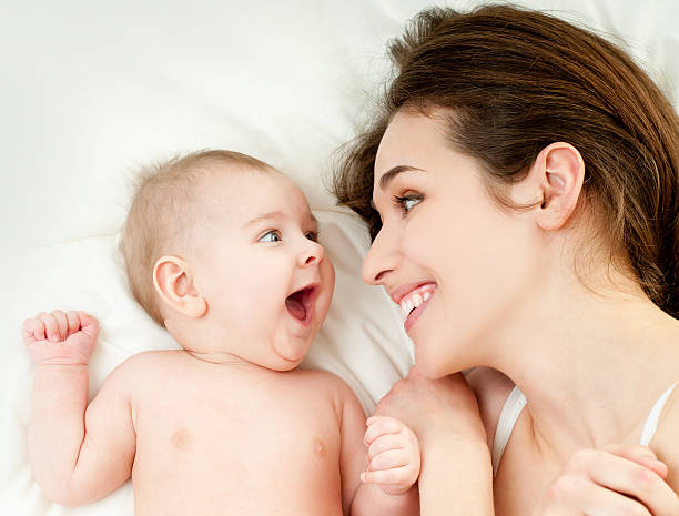happy mother with baby stock photo